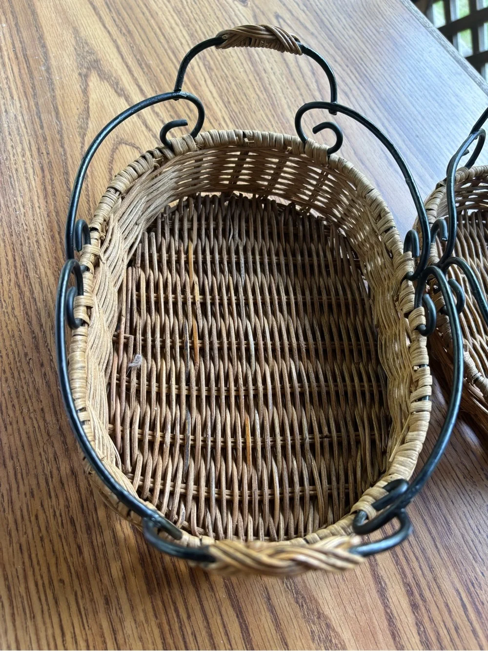 Two Woven Natural Rattan Baskets with Black Metal Handles Big 10x7, Small 8x5